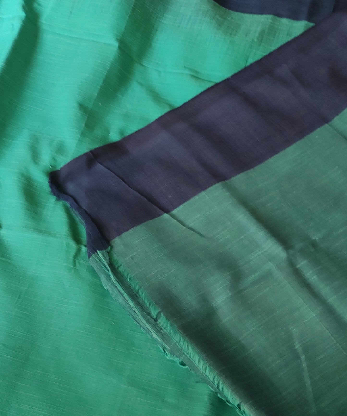 Dark sea green ikkat blended Plain border Linen Khadi Handloom Saree