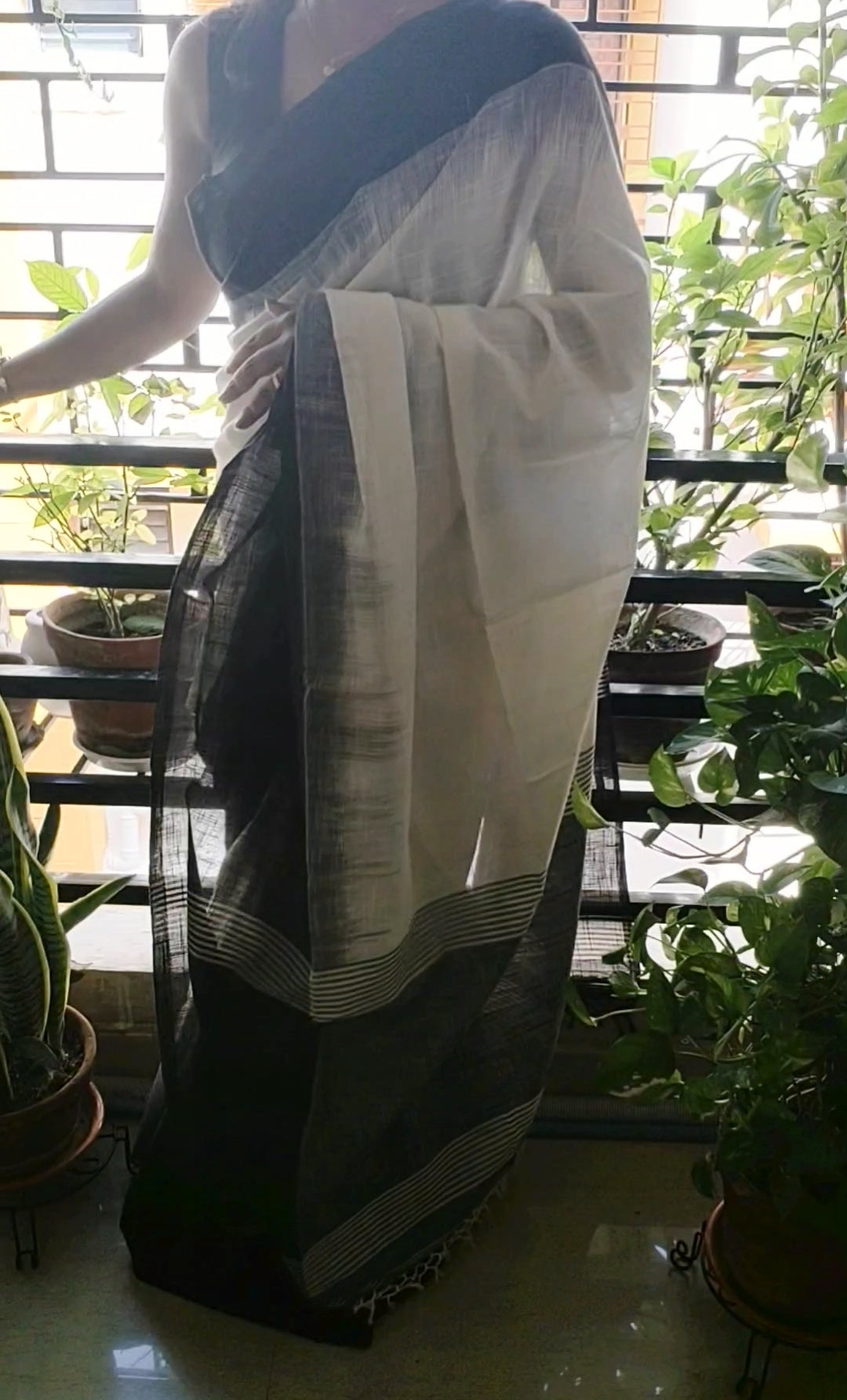 White Linen Cotton Ikkat blended plain black border Saree