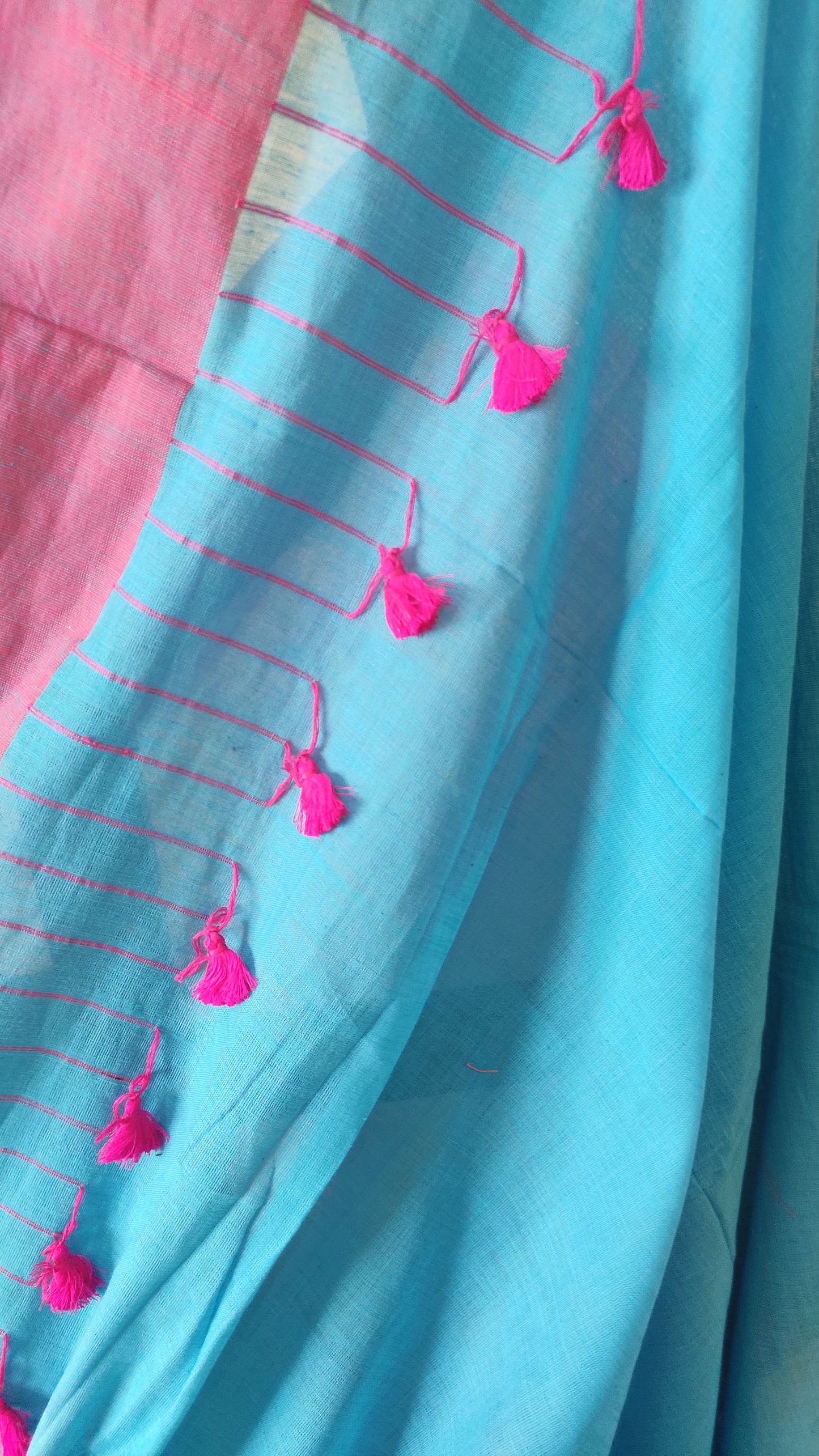 Pink Border on Asmani Blue Shaded Khadi Handloom Self Threaded Pompom Saree