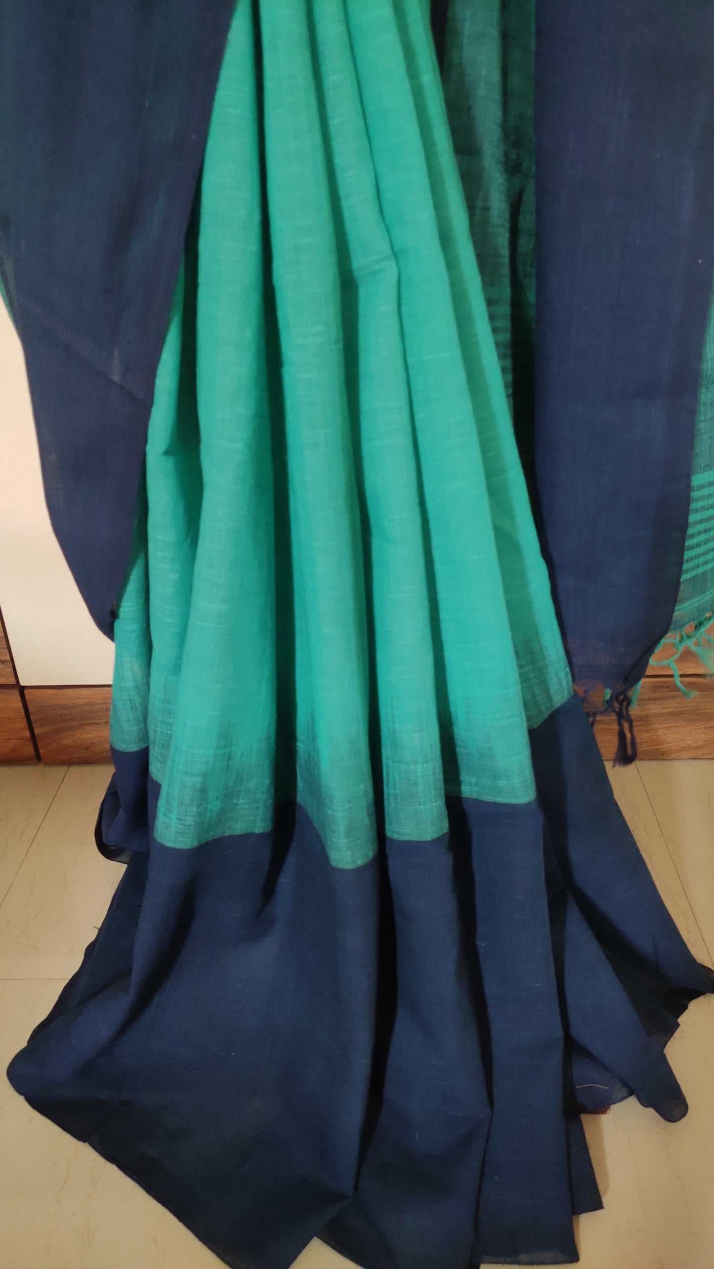 Dark sea green ikkat blended Plain border Linen Khadi Handloom Saree