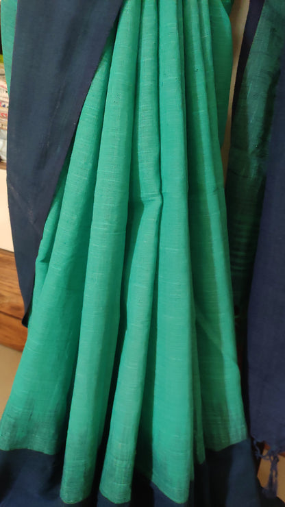 Dark sea green ikkat blended Plain border Linen Khadi Handloom Saree