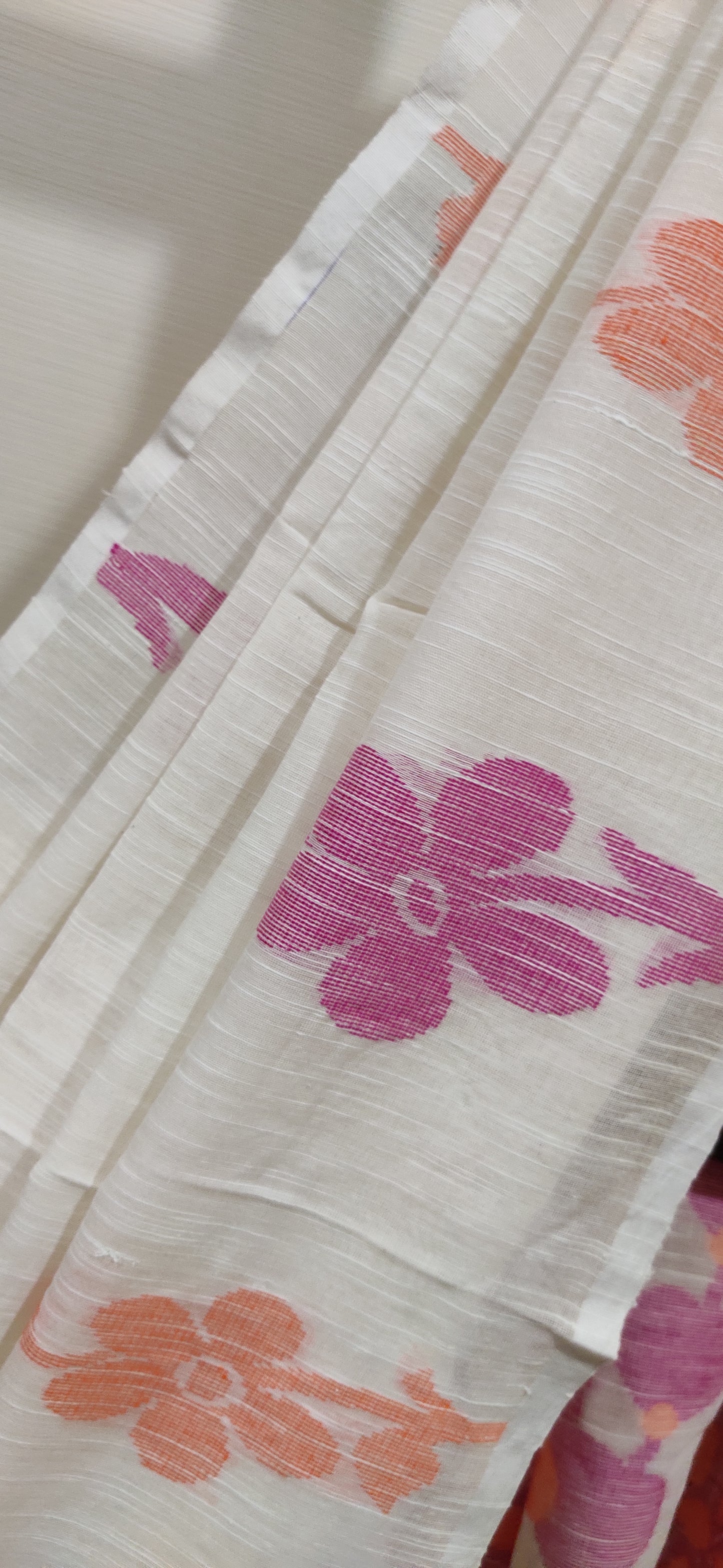 White Slab Cotton Threaded Orange & Pink Floral motif done border saree