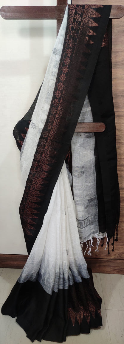 White Linen Ikkat blended zari worked black border done Saree