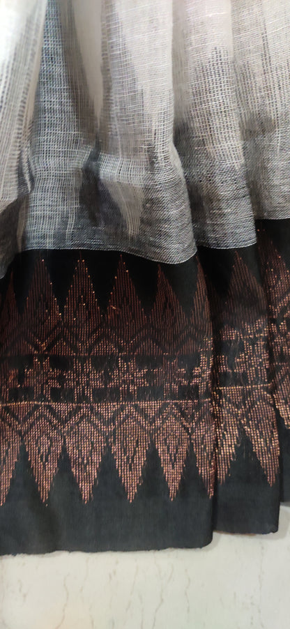 White Linen Ikkat blended zari worked black border done Saree