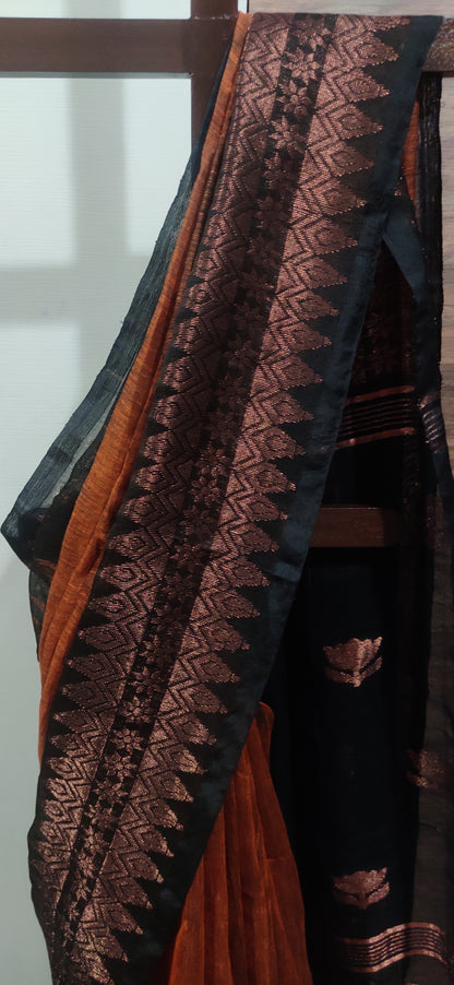 Rust Linen Ikkat blended zari worked black border done Saree