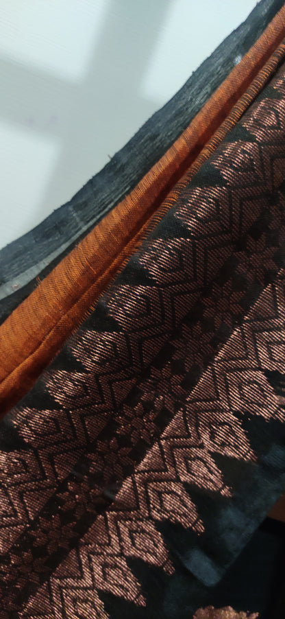 Rust Linen Ikkat blended zari worked black border done Saree