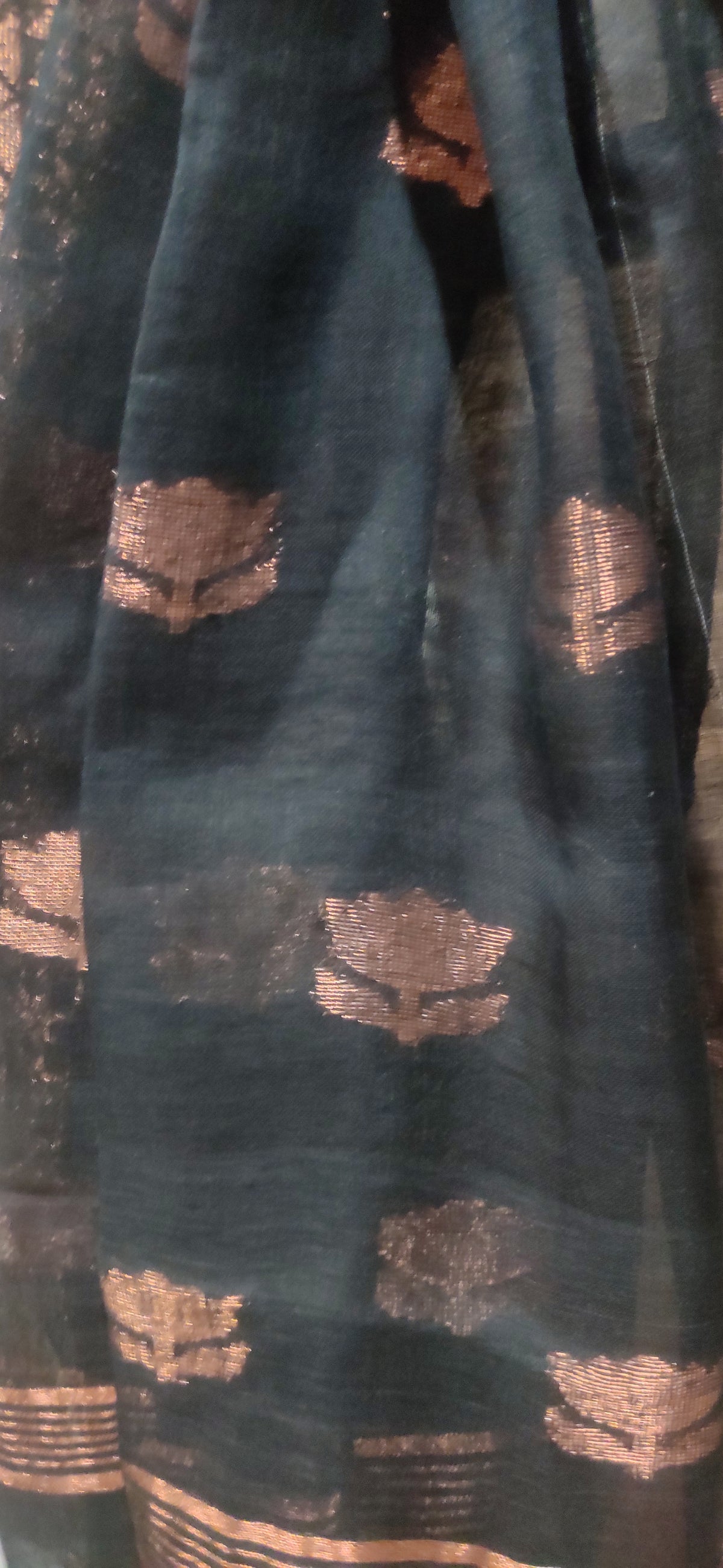 Rust Linen Ikkat blended zari worked black border done Saree