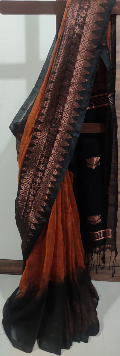 Rust Linen Ikkat blended zari worked black border done Saree