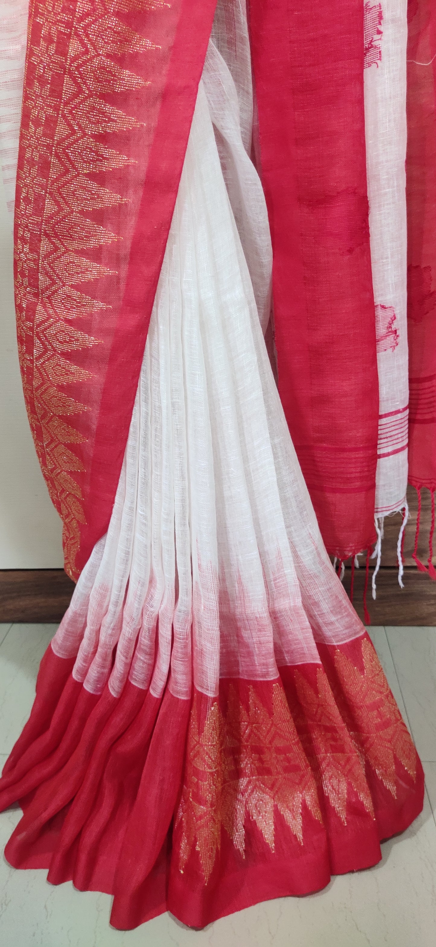 White Linen Ikkat blended zari worked red border done Saree