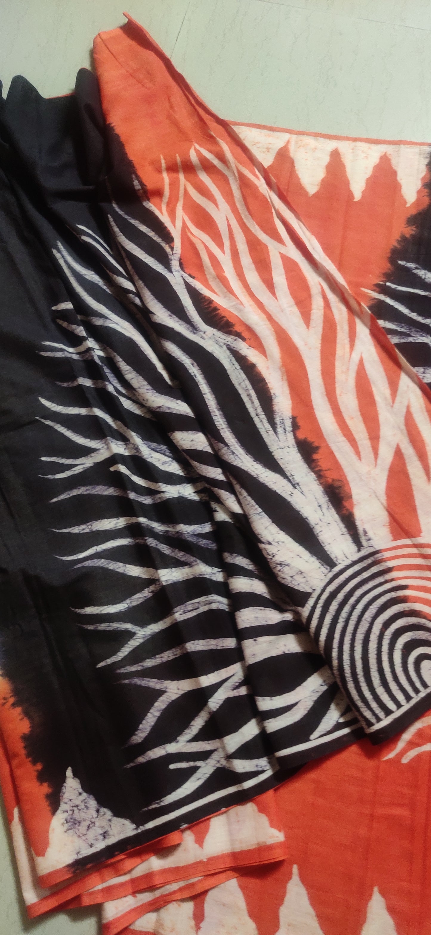 Agneya – White-Orange Hand Batik Cotton Saree