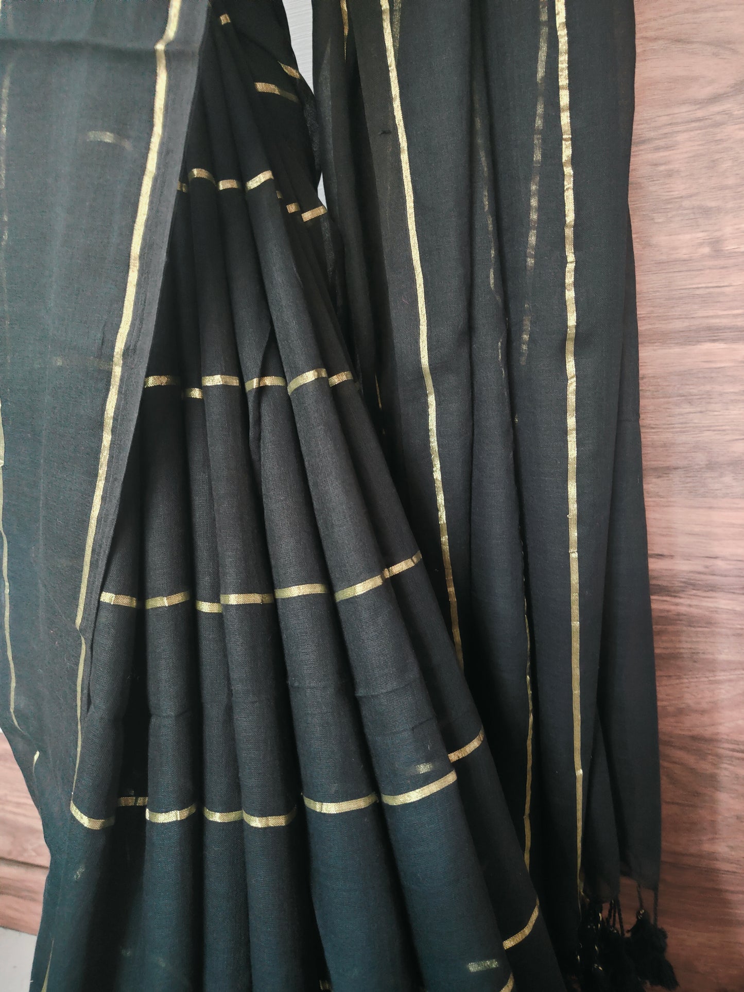 Eternal Black Mul Cotton single color zari stripped Saree