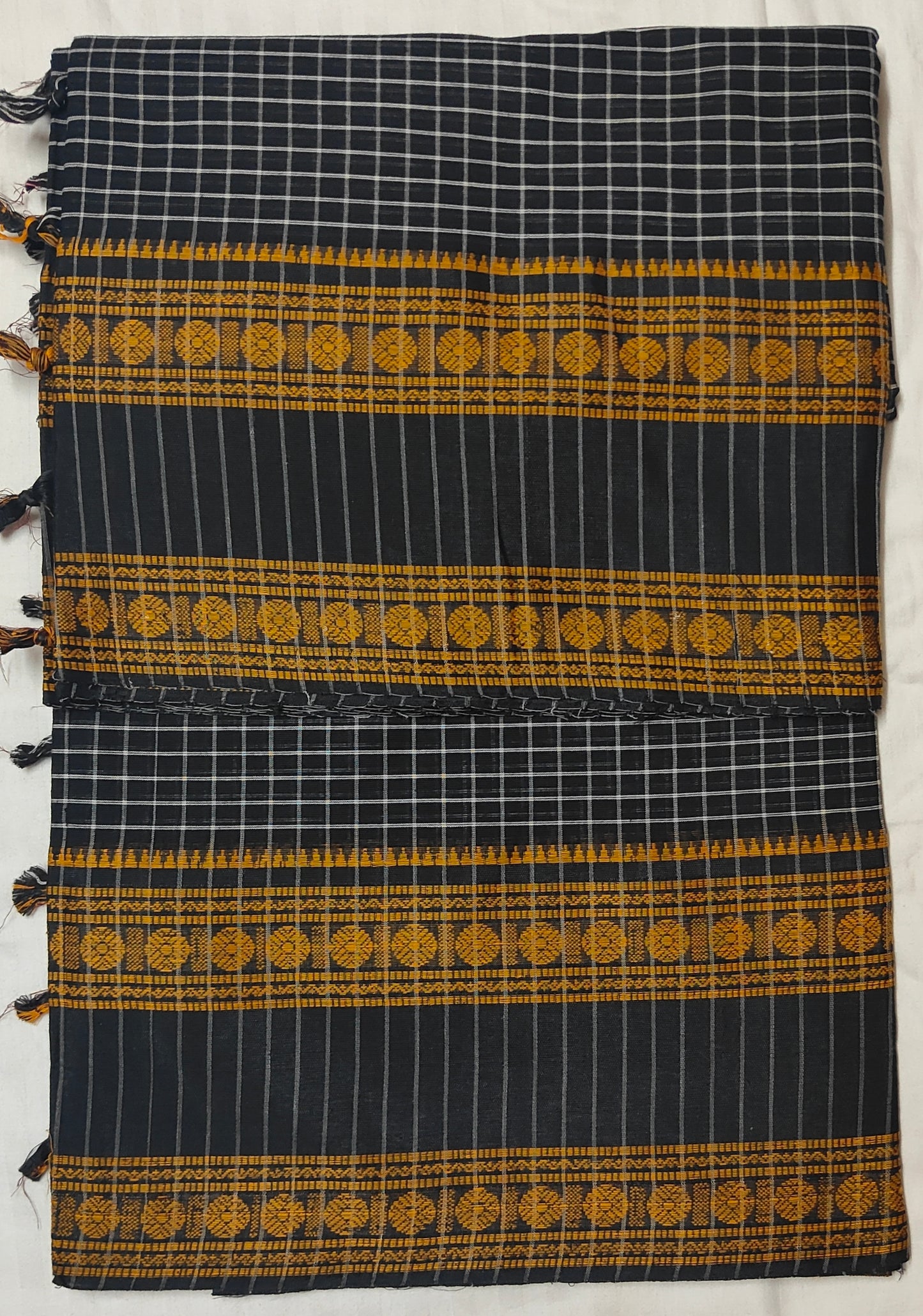 Black Korke Dure Check body contrast traditional border saree