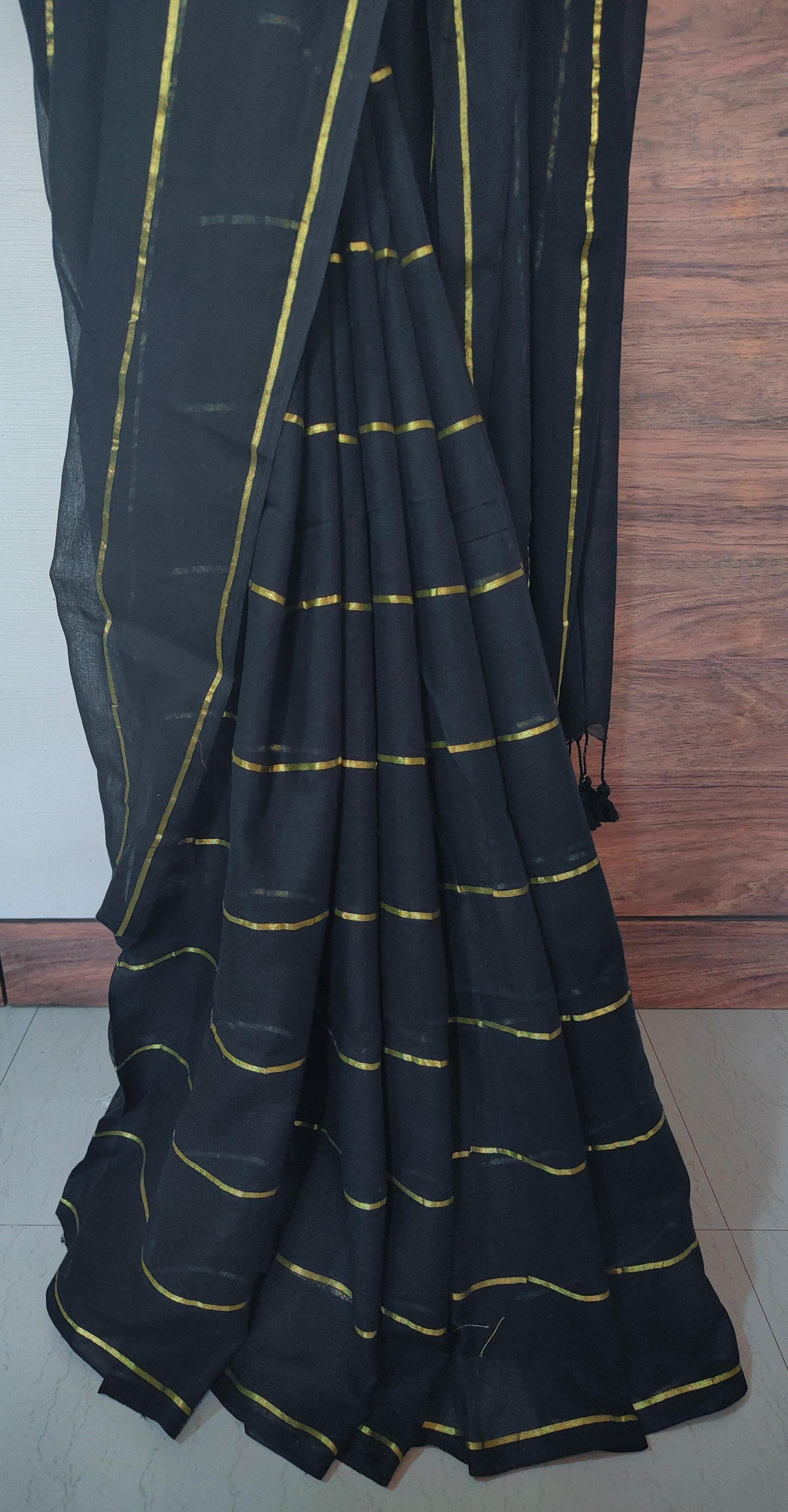 Eternal Black Mul Cotton single color zari stripped Saree