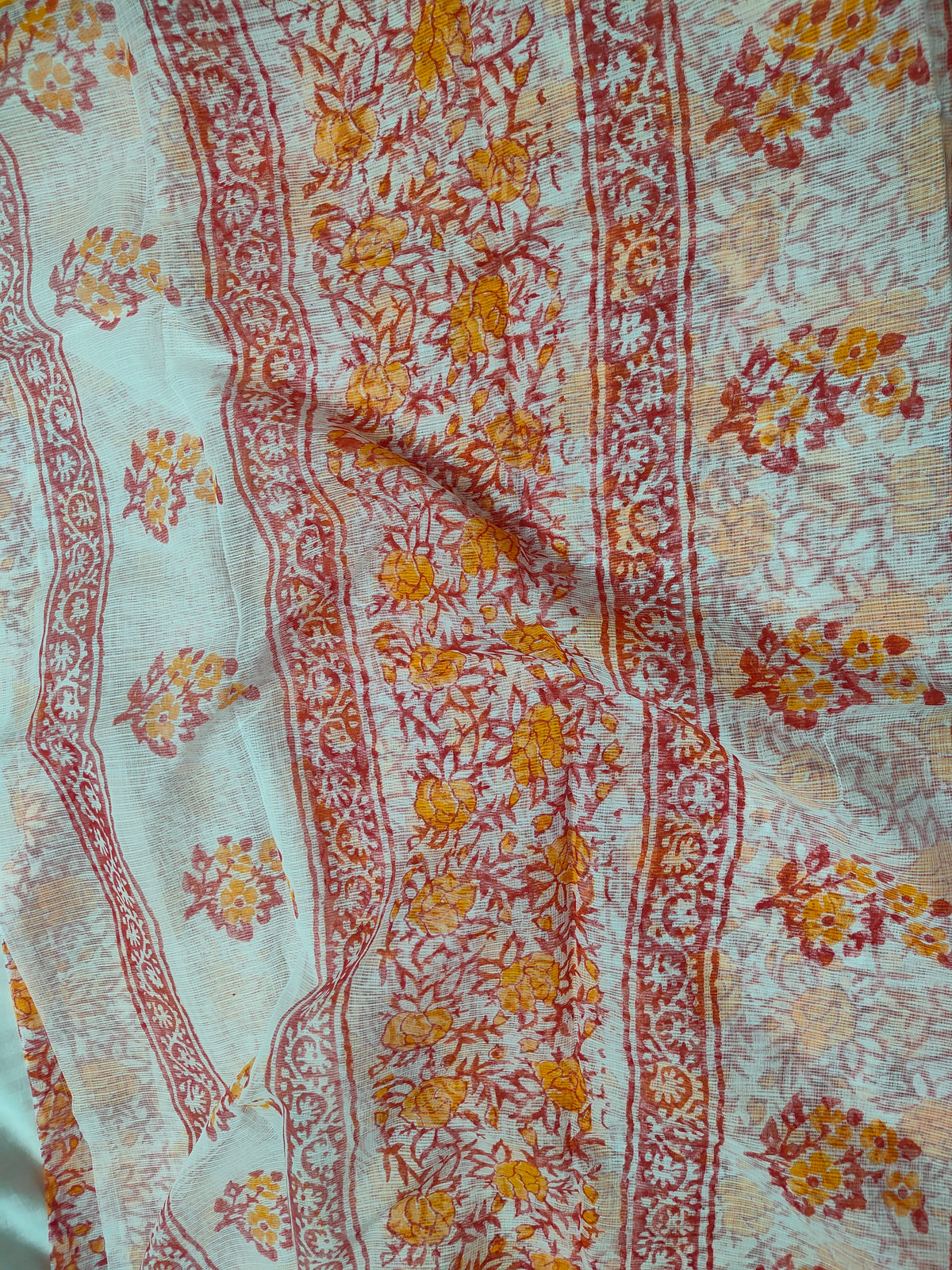 Vanika – Kesariya Bloom Block Print